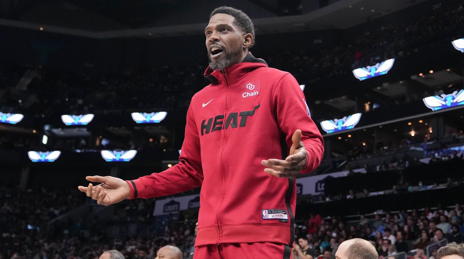 Heat forward Udonis Haslem gestures to an official.